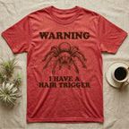 Tarantula Hair Trigger T-Shirt in Heather Red — Engraved curly hair tarantula, front legs half-raised, with the words Warning, I Have a Hair Trigger