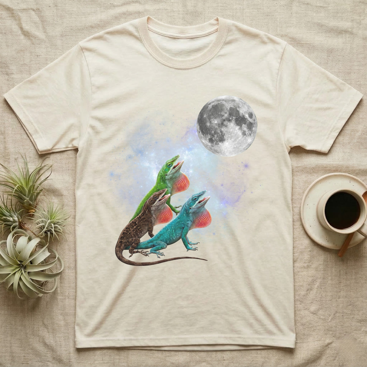 Green Anole Moon Howl T-Shirt in Natural — Three Green Anole colour morphs howling at a full moon over a nebula on a dark grey t-shirt.