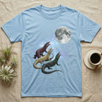 Ackie Monitor Moon Howl T-Shirt in Light Blue — Three Ackie Monitor colour morphs howling at a full moon over a nebula on a dark grey t-shirt.