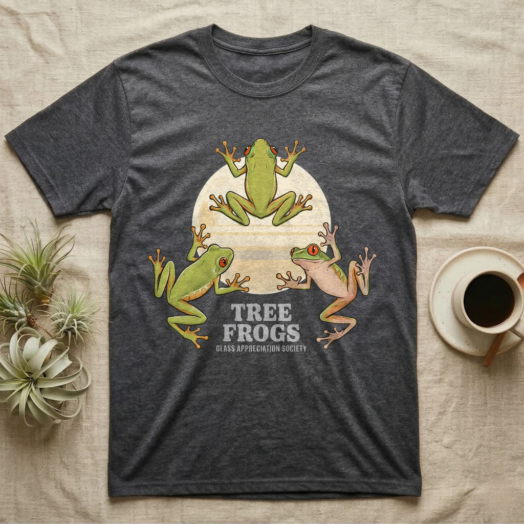 Three Tree Frog Moon T-Shirt in Dark Heather — Retro-illustration of three tree frogs in splayed glass-cling poses around a stratified halftone full moon.
