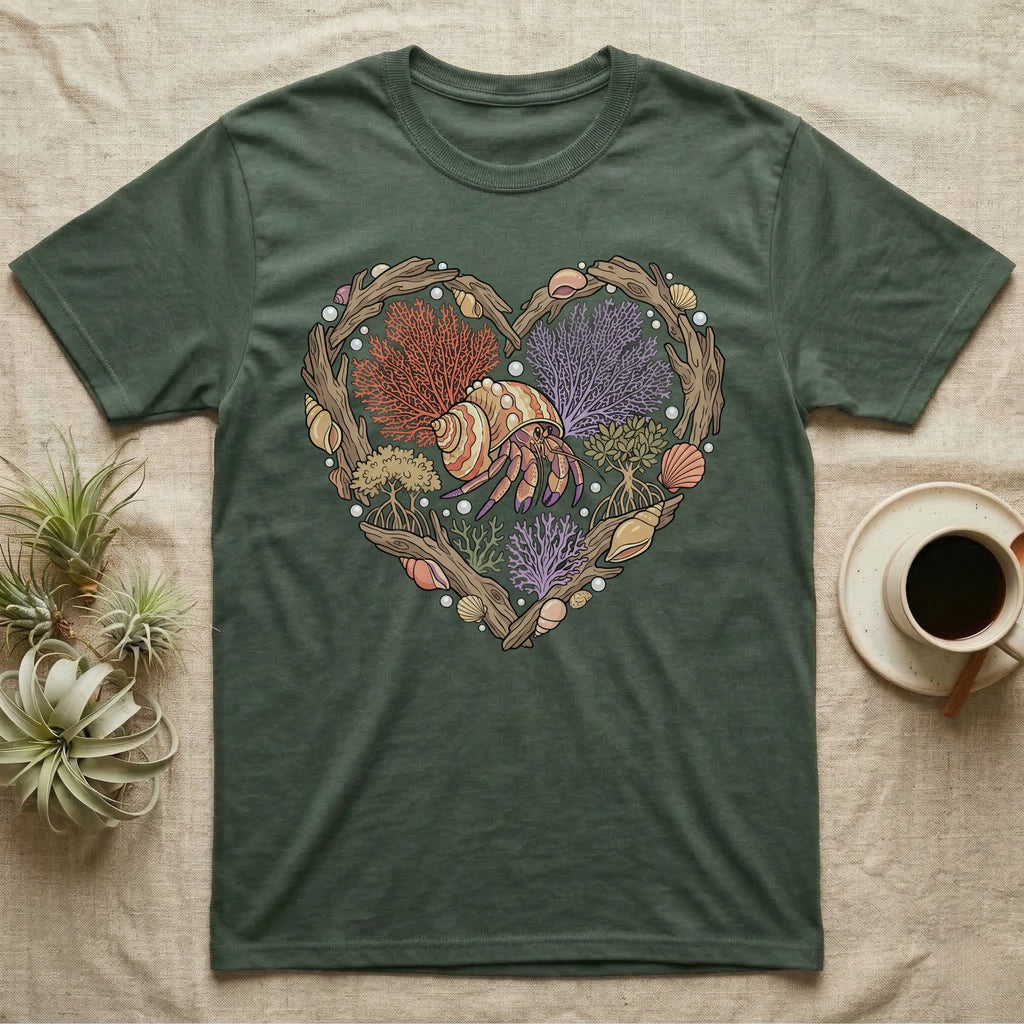 T-shirt with a heart design featuring a hermit crab, coral, and seashells.