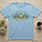 Light blue t-shirt with North American Bullfrog graphic and "Rana catesbeiana" text.
