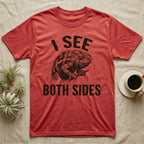 Panther Chameleon Mediator T-Shirt in Heather Red — Etching of a panther chameleon holding a twig, its eyes pointing opposite ways, under I SEE, above BOTH SIDES
