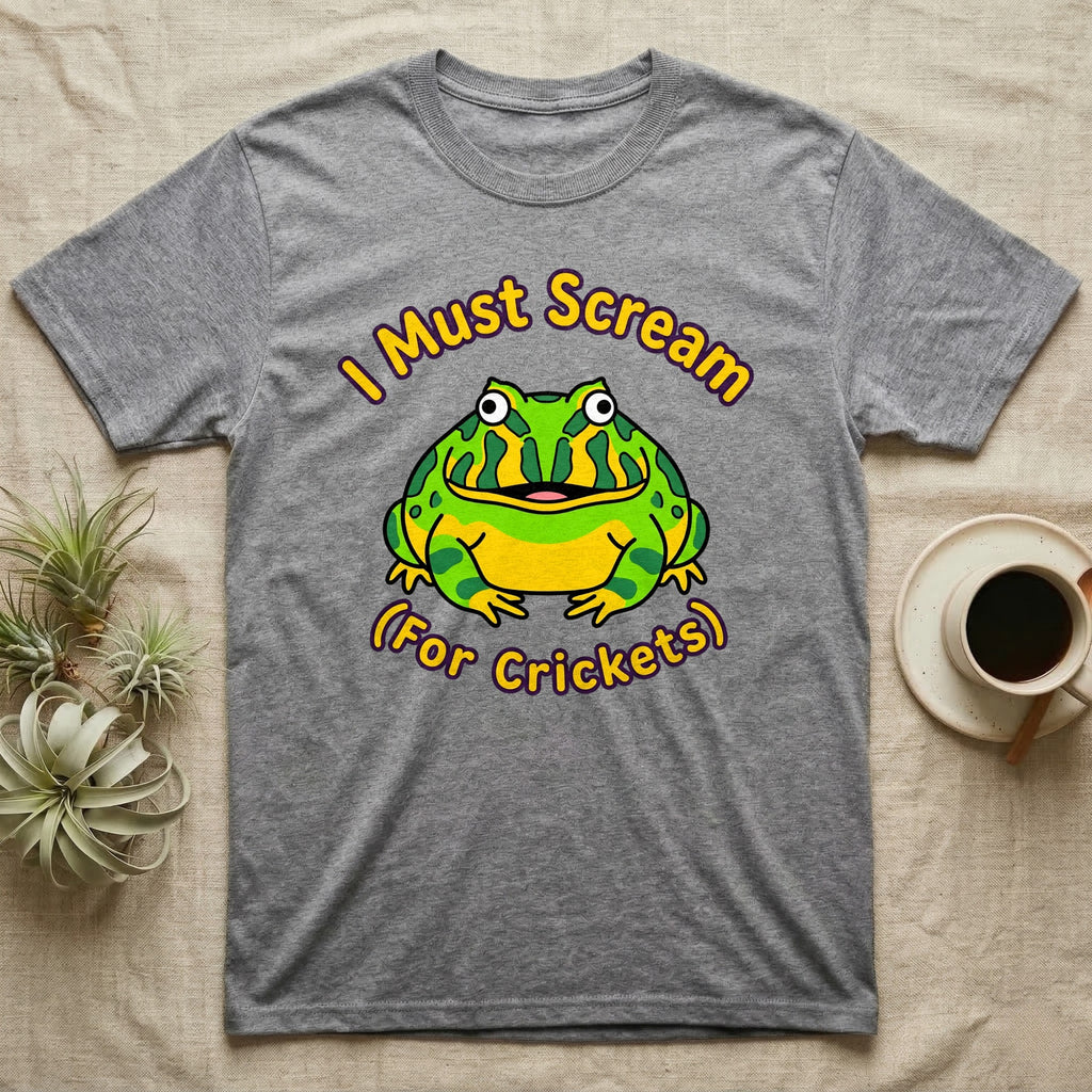Gray t-shirt with a cartoon frog that says "I Must Scream (For Crickets)".