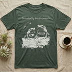 Technically Not Poisonous Dart Frog T-Shirt in Military Green — Three blue poison dart frogs on a bark ledge in distressed screen-print style under the line Technically Not Poisonous.