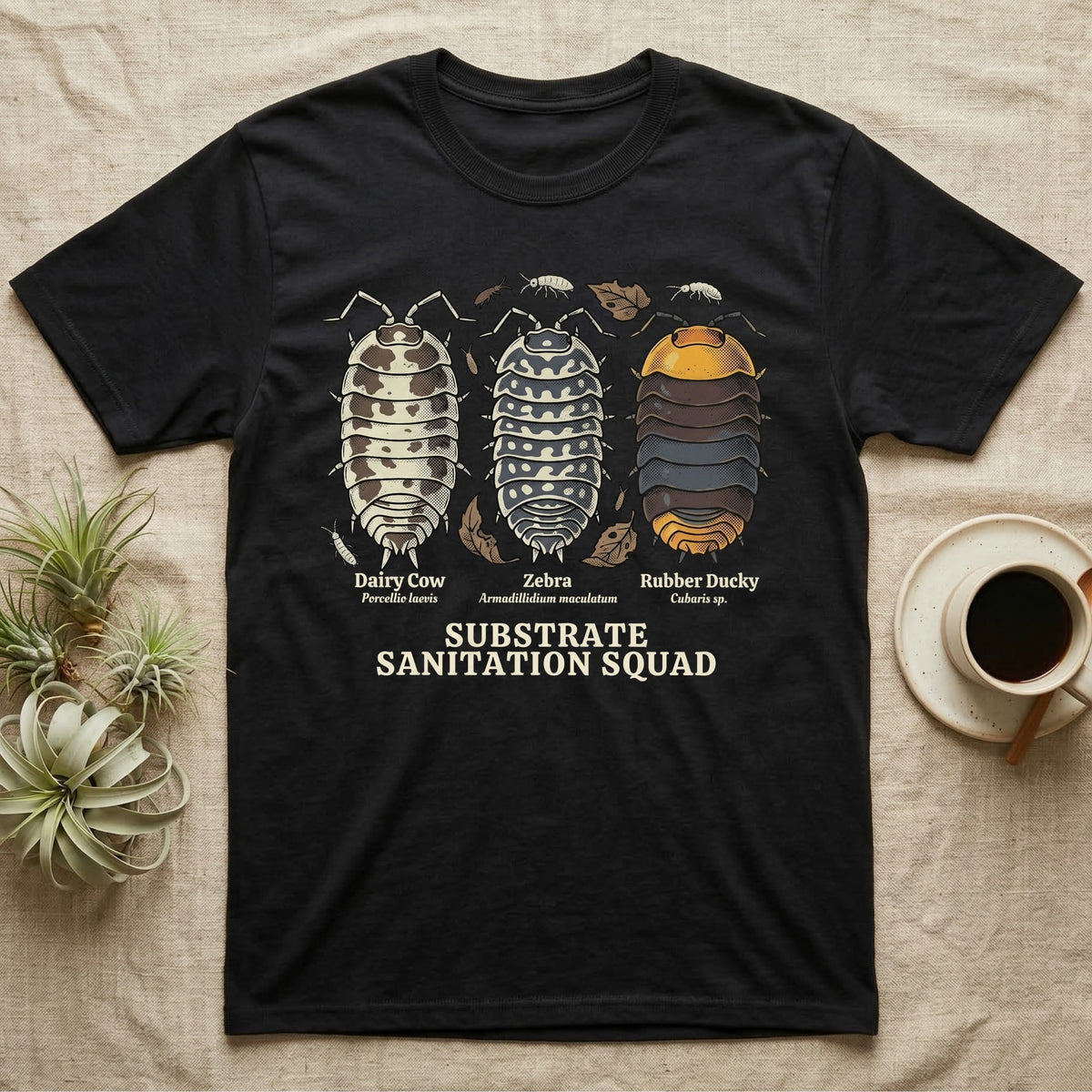 Isopod Substrate Sanitation Squad T-Shirt in Black — Engraved chart of dairy cow, zebra and rubber ducky isopods labelled with their scientific names.