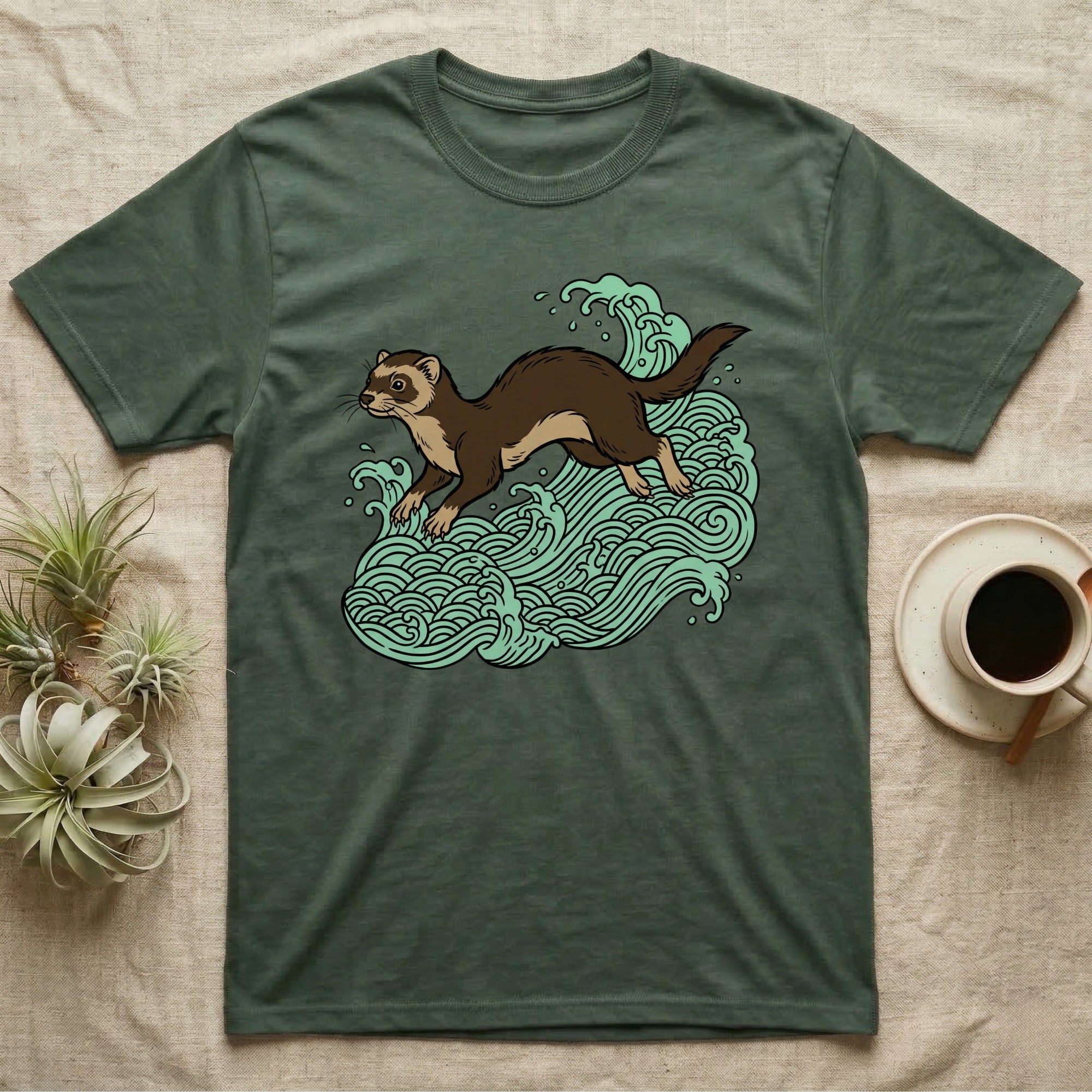 Ferret running through mint green waves on a dark green t-shirt.