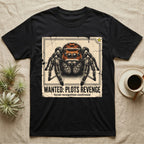 Jumping Spider Wanted T-Shirt in Black — Distressed wanted-poster illustration of a front-facing jumping spider with the banner text plots revenge below.