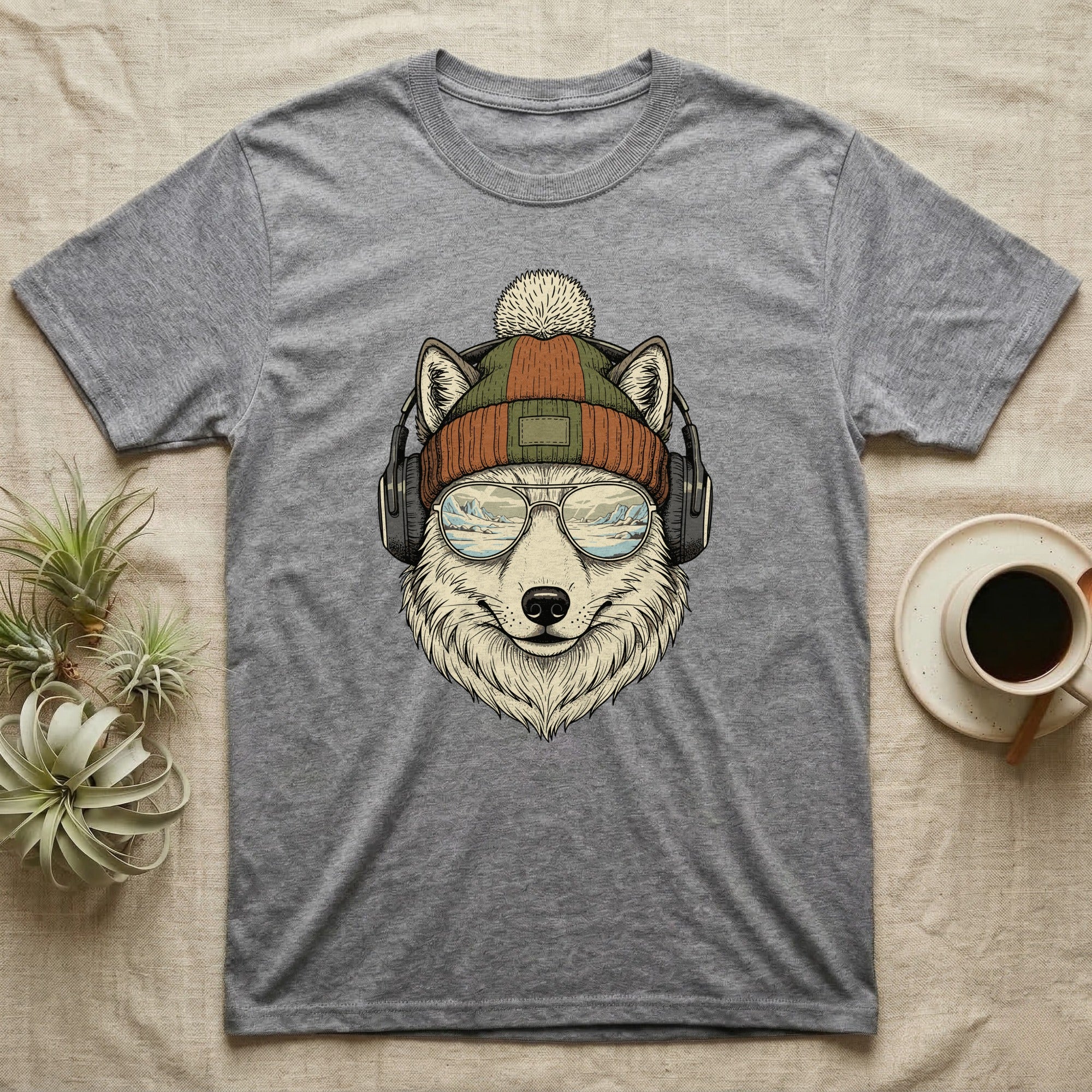 Grey t-shirt with a graphic of a wolf wearing a beanie, headphones, and sunglasses.