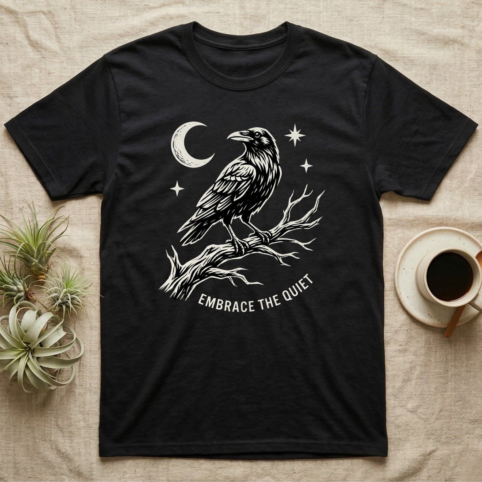 Black t-shirt with a raven on a branch, moon, and stars design.