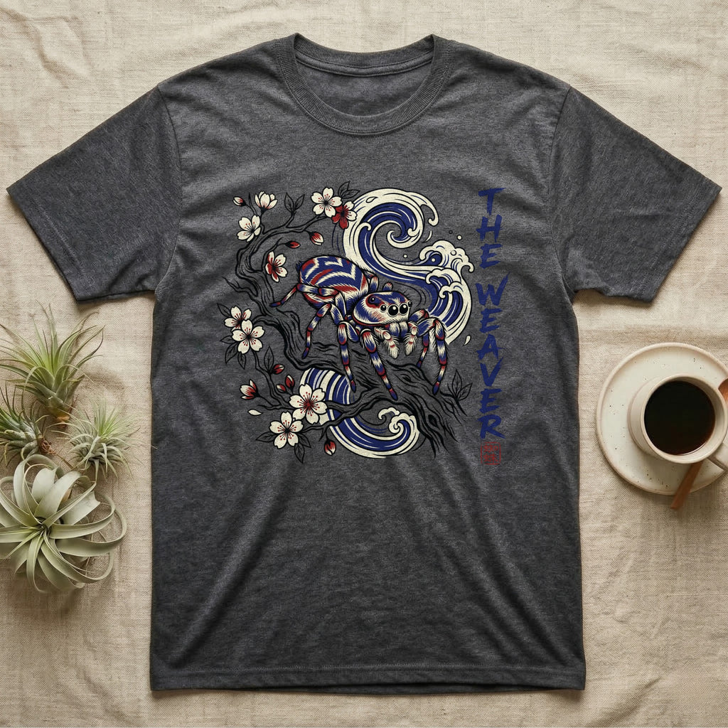 Dark grey t-shirt with spider, waves, and cherry blossoms graphic and "The Weaver" text.