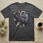 Dark grey t-shirt with spider, waves, and cherry blossoms graphic and "The Weaver" text.