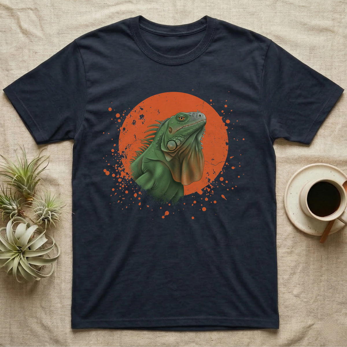Green Iguana Stink Face T-Shirt in Navy — Distressed vintage-style illustration of a green iguana with its dewlap fully dropped and chin lifted, on an orange disc.