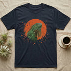 Green Iguana Stink Face T-Shirt in Navy — Distressed vintage-style illustration of a green iguana with its dewlap fully dropped and chin lifted, on an orange disc.