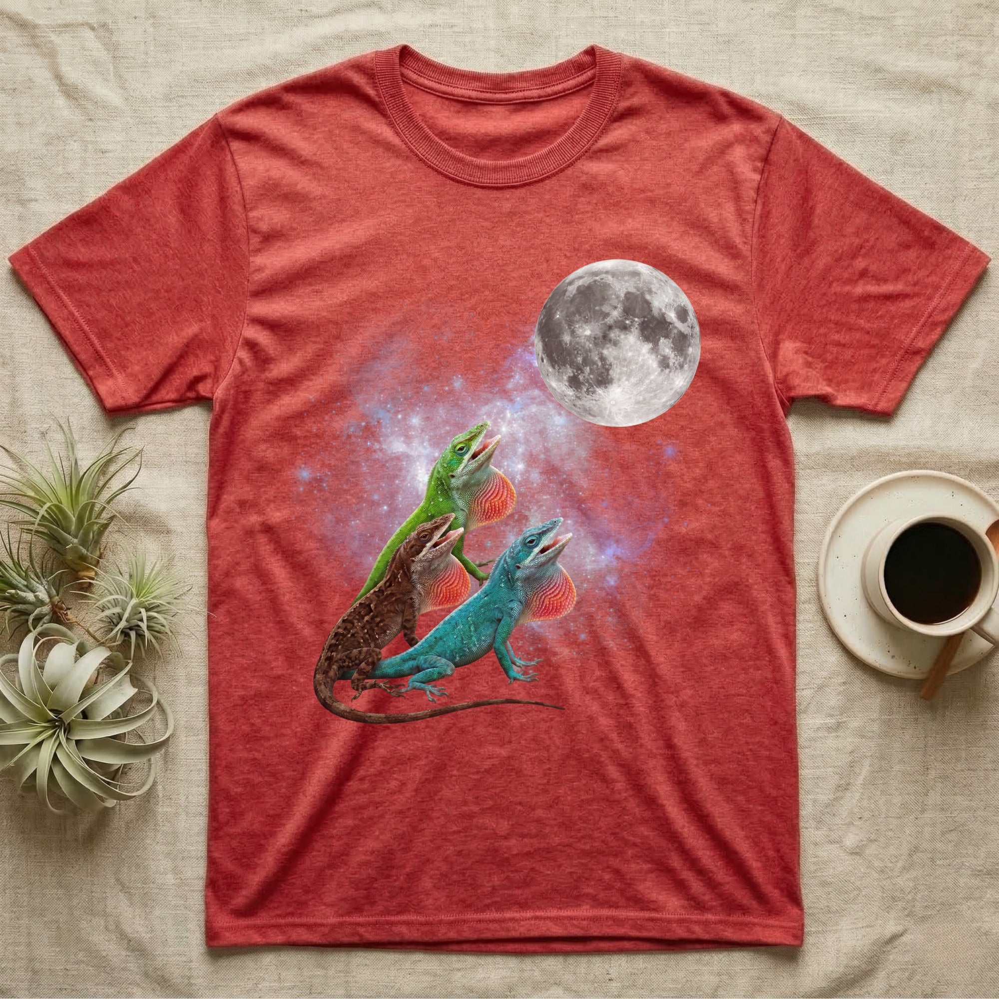 Green Anole Moon Howl T-Shirt in Heather Red — Three Green Anole colour morphs howling at a full moon over a nebula on a dark grey t-shirt.
