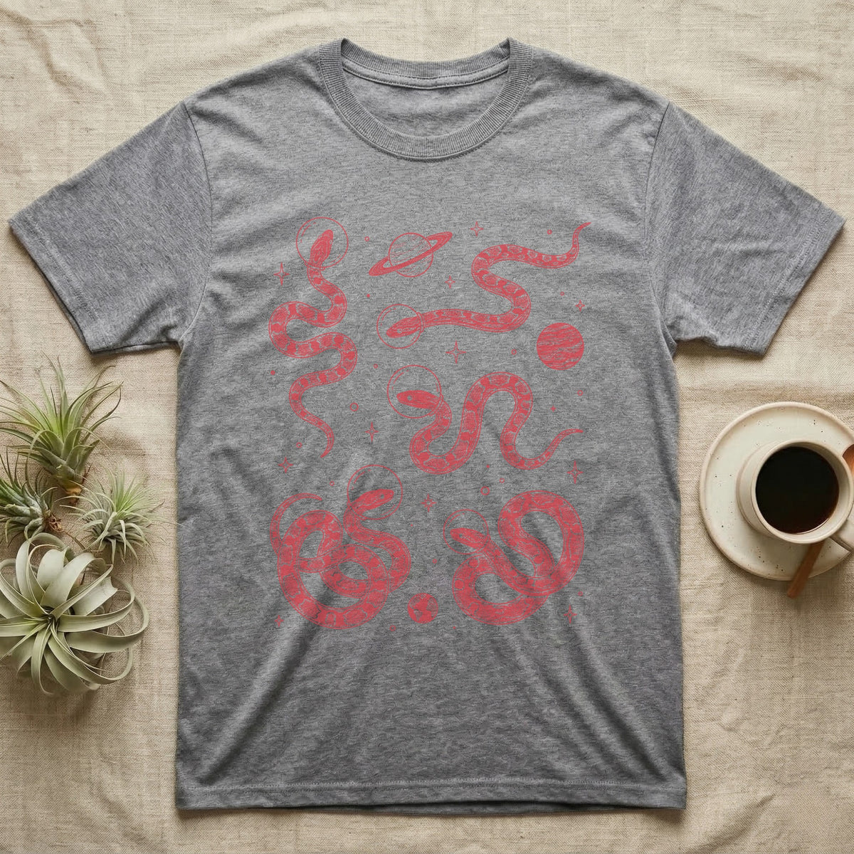 Corn Snake Cosmic T-Shirt in Sport Grey — Vintage screen-print illustration of corn snakes in astronaut helmets floating in space, cosmic crimson monochromatic on dark background.