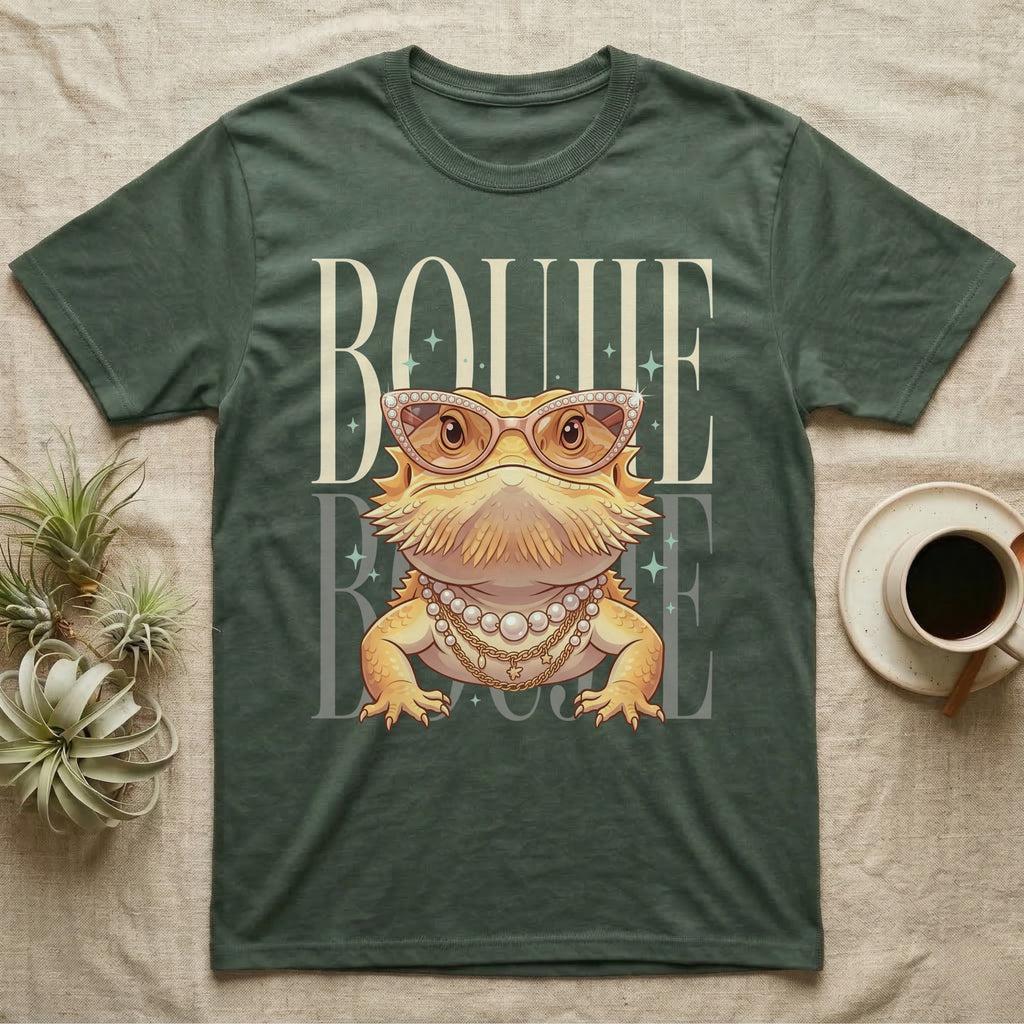 Bearded dragon wearing sunglasses and pearls on a t-shirt.