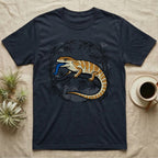 Dark blue t-shirt with orange and yellow bearded dragon illustration on bamboo branch.