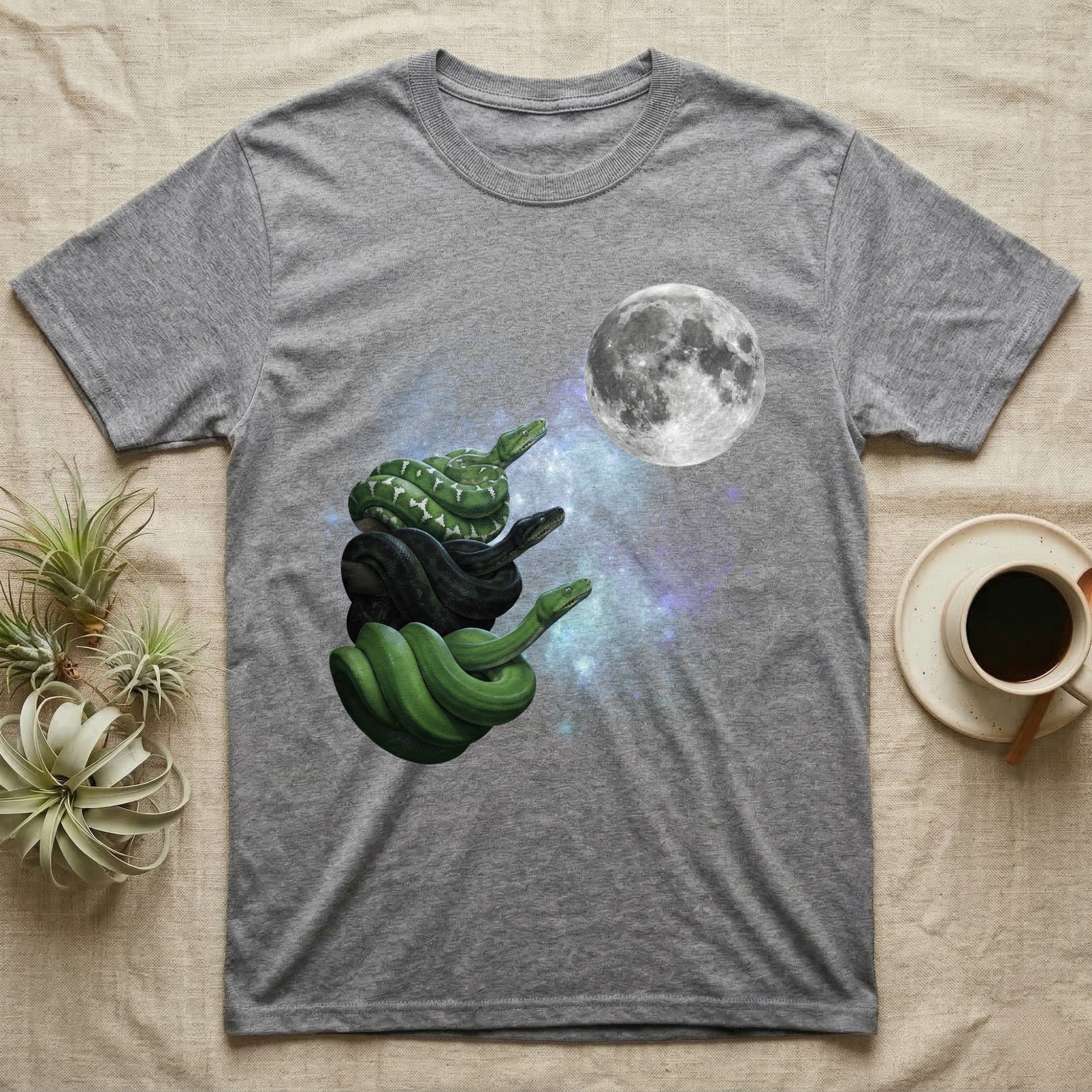 Emerald Tree Boa Moon Howl T-Shirt in Sport Grey — Three Emerald Tree Boa colour morphs howling at a full moon over a nebula on a dark grey t-shirt.
