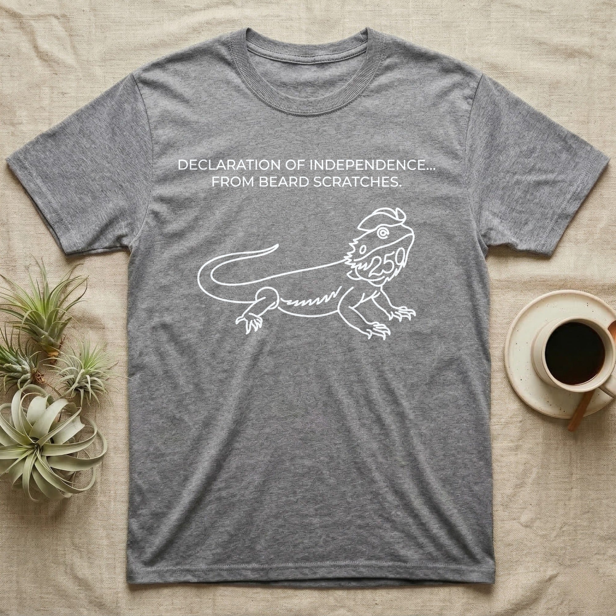 Bearded Dragon Line Art T-Shirt in Sport Grey — White single-line bearded dragon in a tricorn hat under text Declaration of Independence From Beard Scratches.