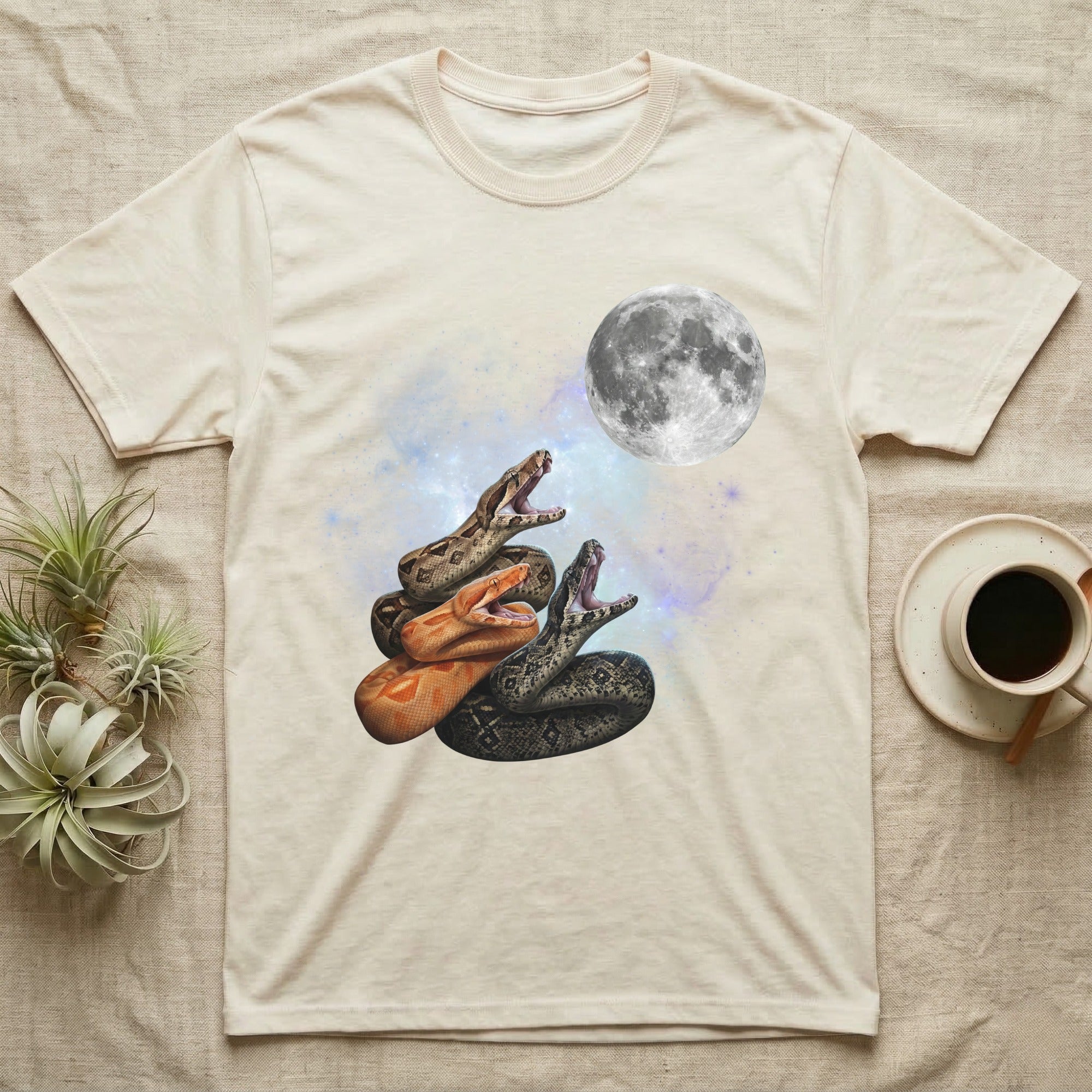 Boa Constrictor Moon Howl T-Shirt in Natural — Three Boa Constrictor colour morphs howling at a full moon over a nebula on a dark grey t-shirt.