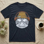 Leopard Gecko Headphones T-Shirt in Navy — Engraved leopard gecko with spotted skin in a beanie and headphones, aviators reflecting a desert canyon.
