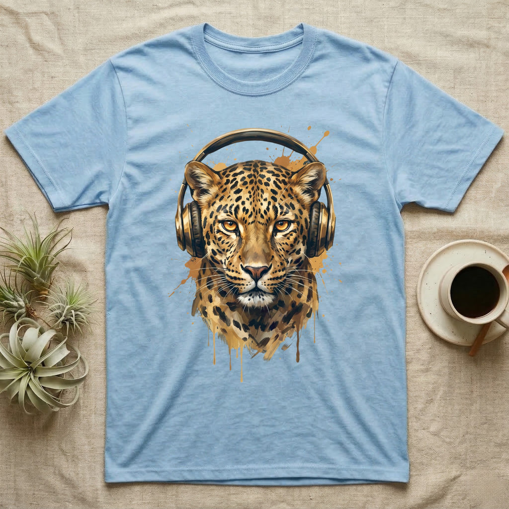 Light blue t-shirt featuring a watercolor leopard wearing golden headphones.