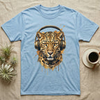 Light blue t-shirt featuring a watercolor leopard wearing golden headphones.