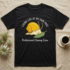 Black t-shirt with a snail graphic and text "Living life at my own pace" and "Professional Cleanup Crew".