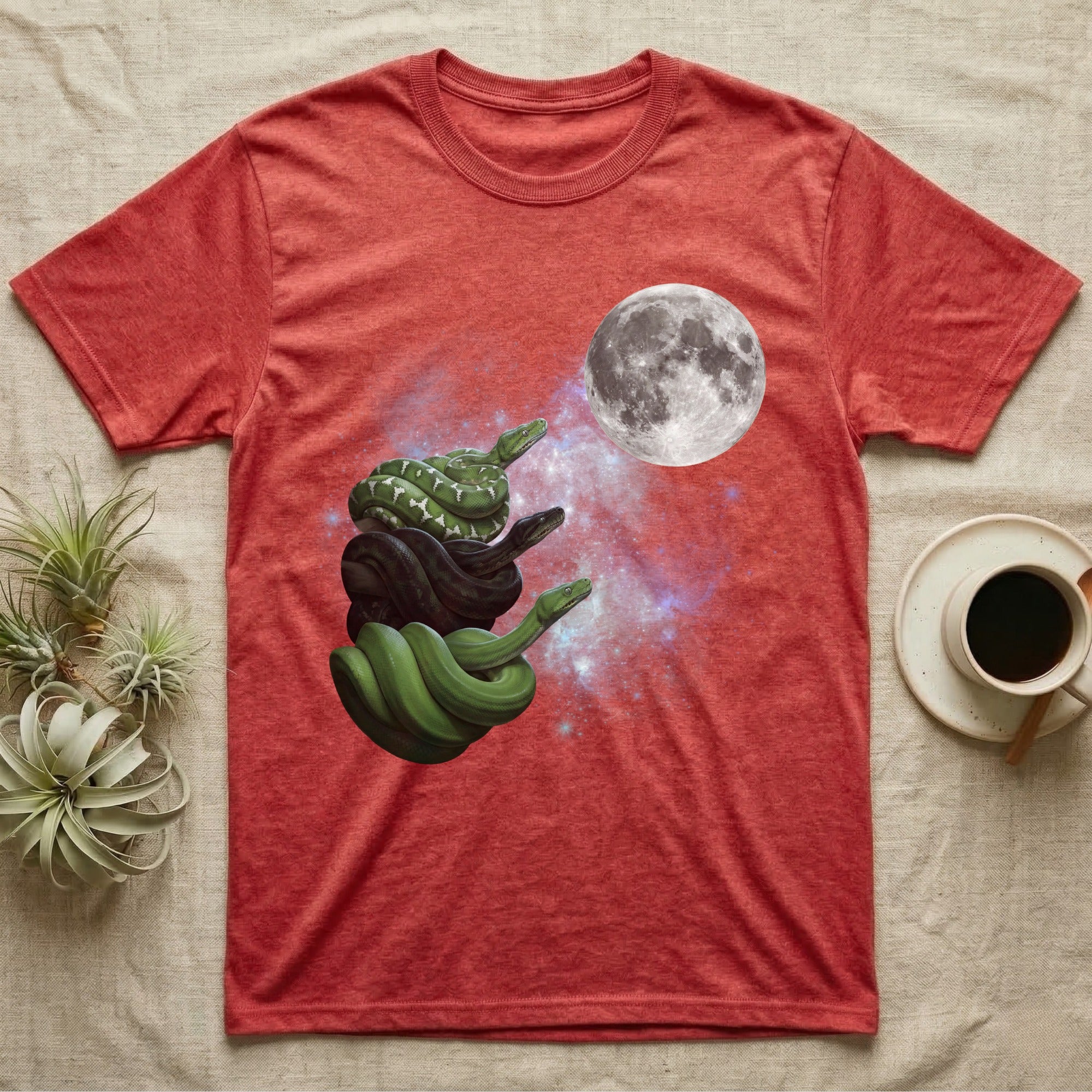 Emerald Tree Boa Moon Howl T-Shirt in Heather Red — Three Emerald Tree Boa colour morphs howling at a full moon over a nebula on a dark grey t-shirt.