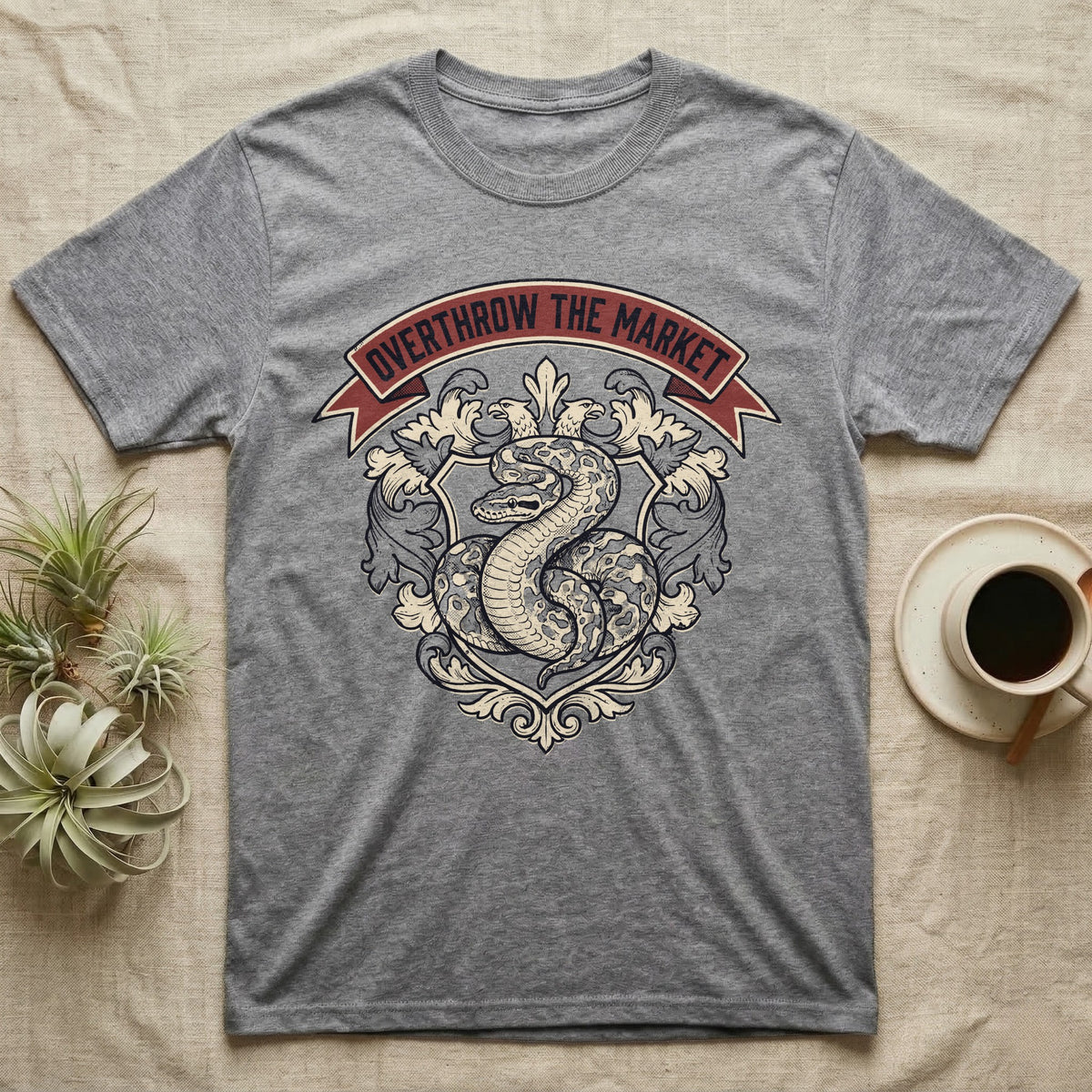 Overthrow The Market Python T-Shirt in Sport Grey — Vintage heraldic-crest illustration of a regal ball python with a banner reading "Overthrow The Market."