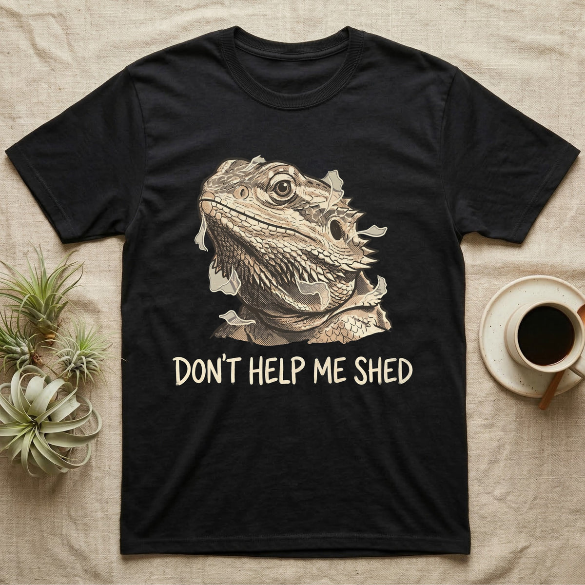 Don't Help Me Shed T-Shirt in Black — Retro-illustration of a bearded dragon mid-shed with a deadpan side-eye and a marker caption reading Don't Help Me Shed.