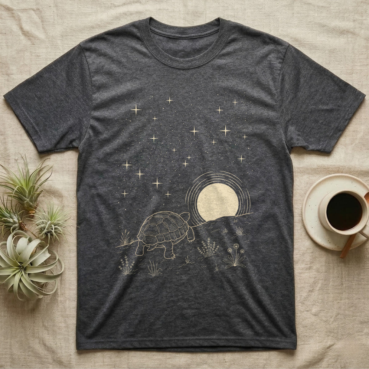 Russian Tortoise Moonlight T-Shirt in Dark Heather — Scratchboard-style Russian tortoise walking up a steppe ridge toward a setting moon under a starry sky