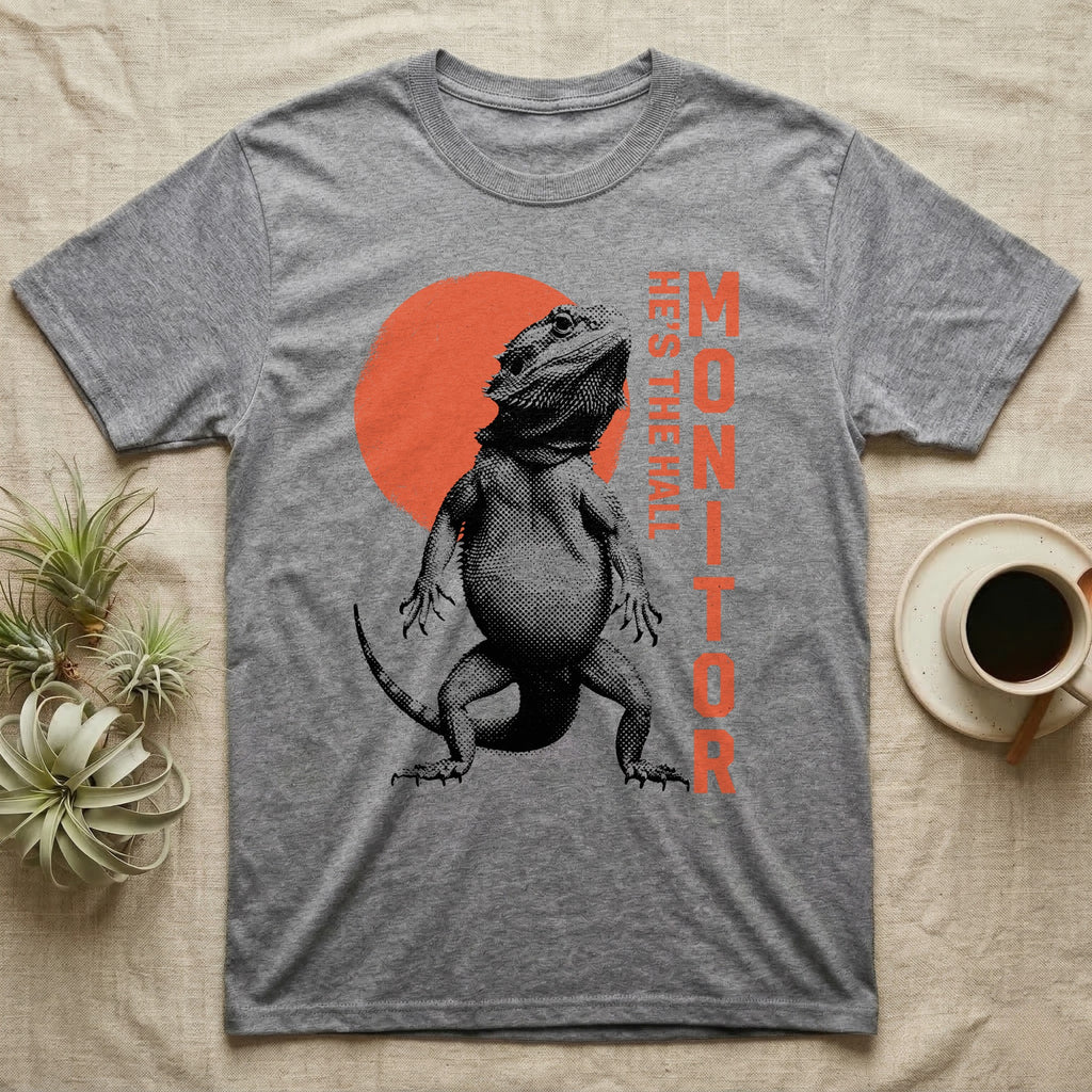 Bearded Dragon Hall Monitor T-Shirt in Sport Grey — Coarse halftone illustration of a bearded dragon mid-stride, a distressed vermilion disc behind and HALL MONITOR alongside.