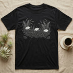 Box Turtle Botanical T-Shirt in Black — Three small eastern box turtles in fine white line ringing a fanned spray of ferns, grasses and leaf litter.