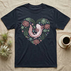 Dark t-shirt with a heart-shaped floral design featuring a pink axolotl.