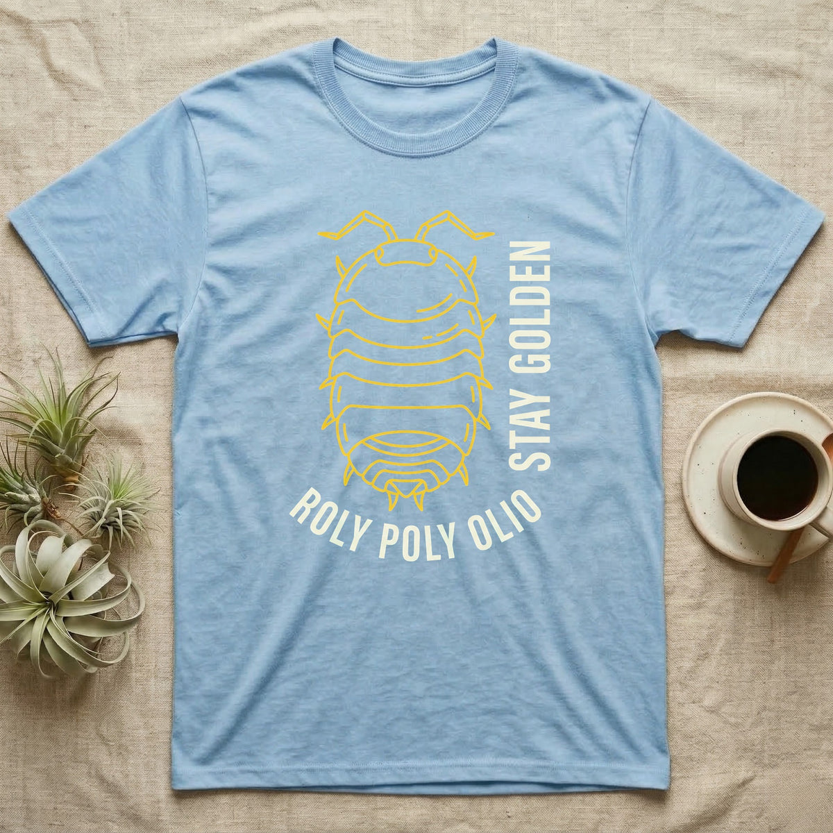 Roly Poly Isopod Stay Golden T-Shirt in Light Blue — Golden outline drawing of a spined roly poly isopod beside vertical cream "Stay Golden" lettering.