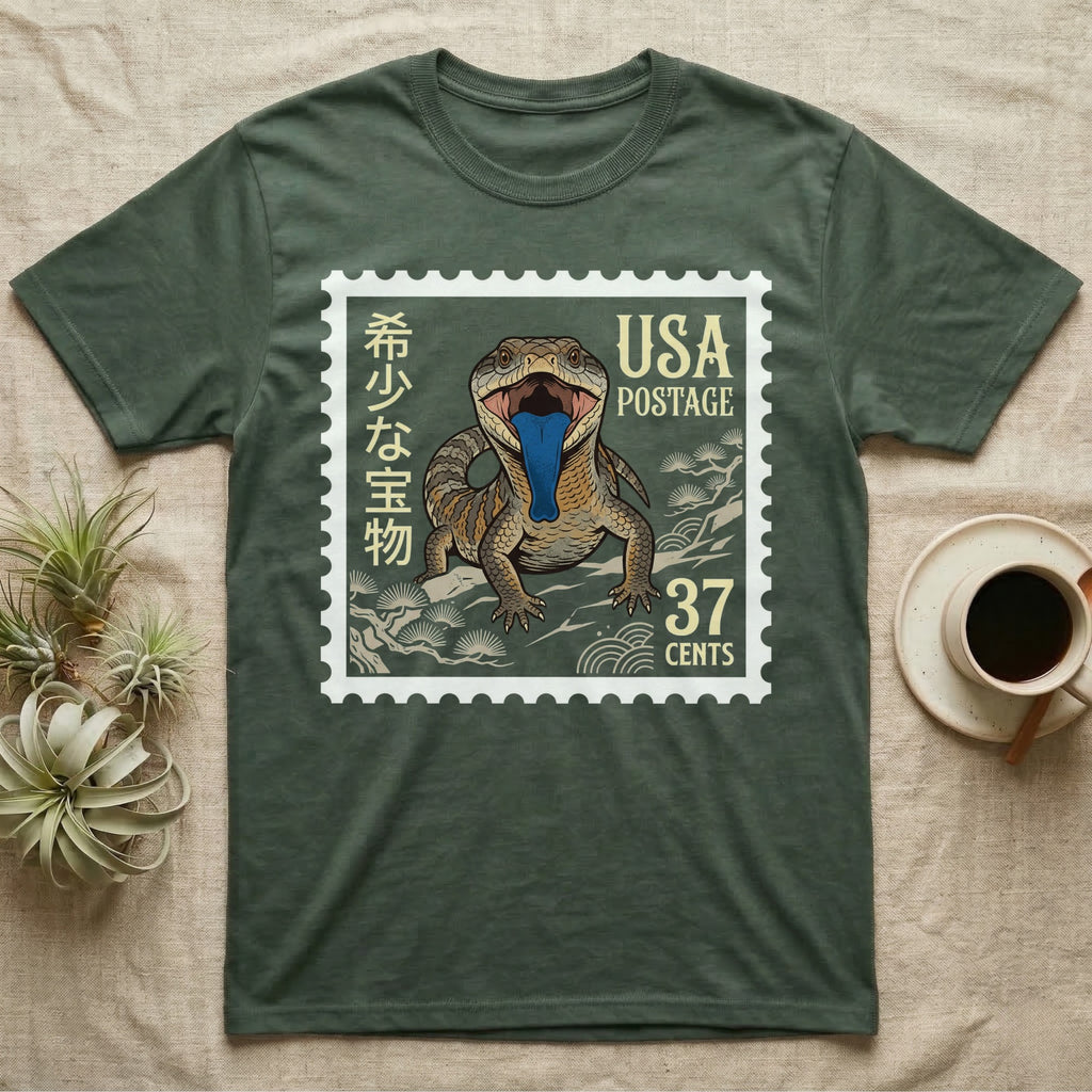 T-shirt with a stamp graphic featuring a lizard with a blue tongue and Japanese text.
