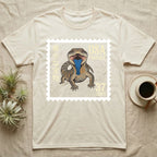T-shirt with a vintage stamp design featuring a lizard with its tongue out.