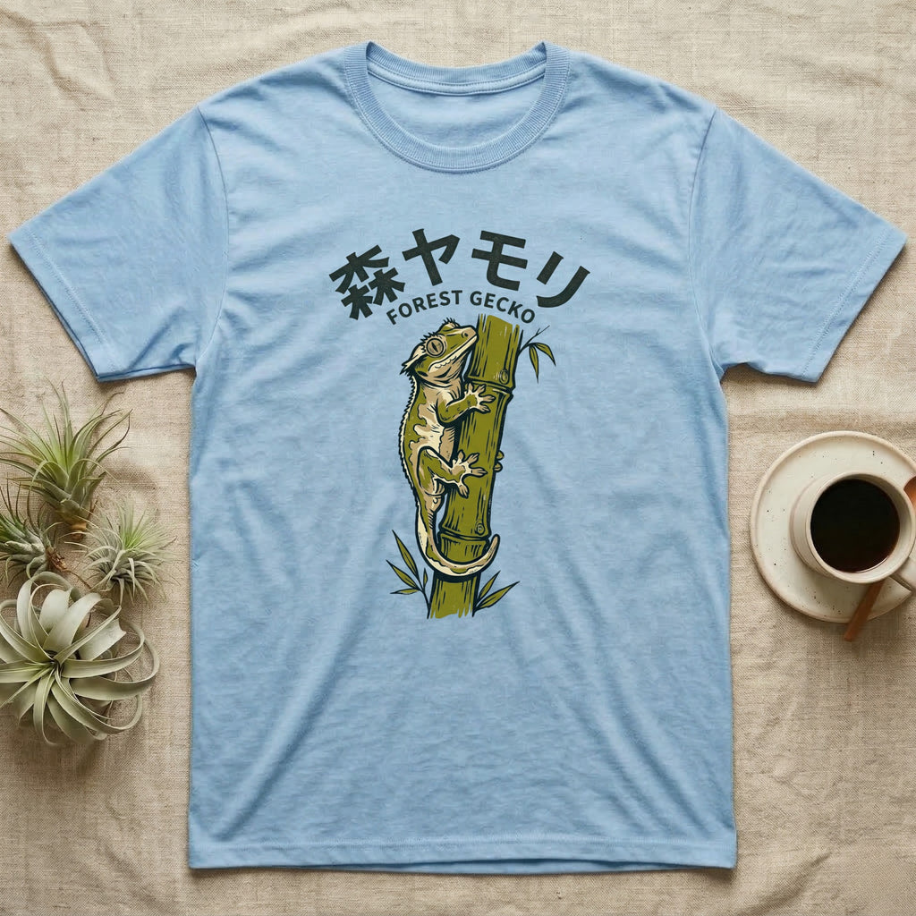 Light blue t-shirt featuring a green gecko climbing a bamboo stalk.