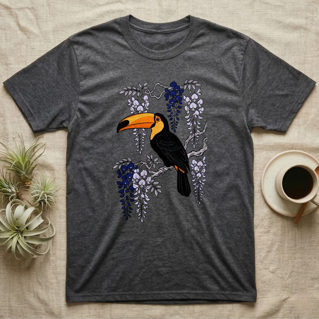 Dark gray t-shirt with a toucan perched on a branch with purple wisteria.