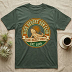Green t-shirt with "High Desert Sun Club" logo featuring a lizard and sun.