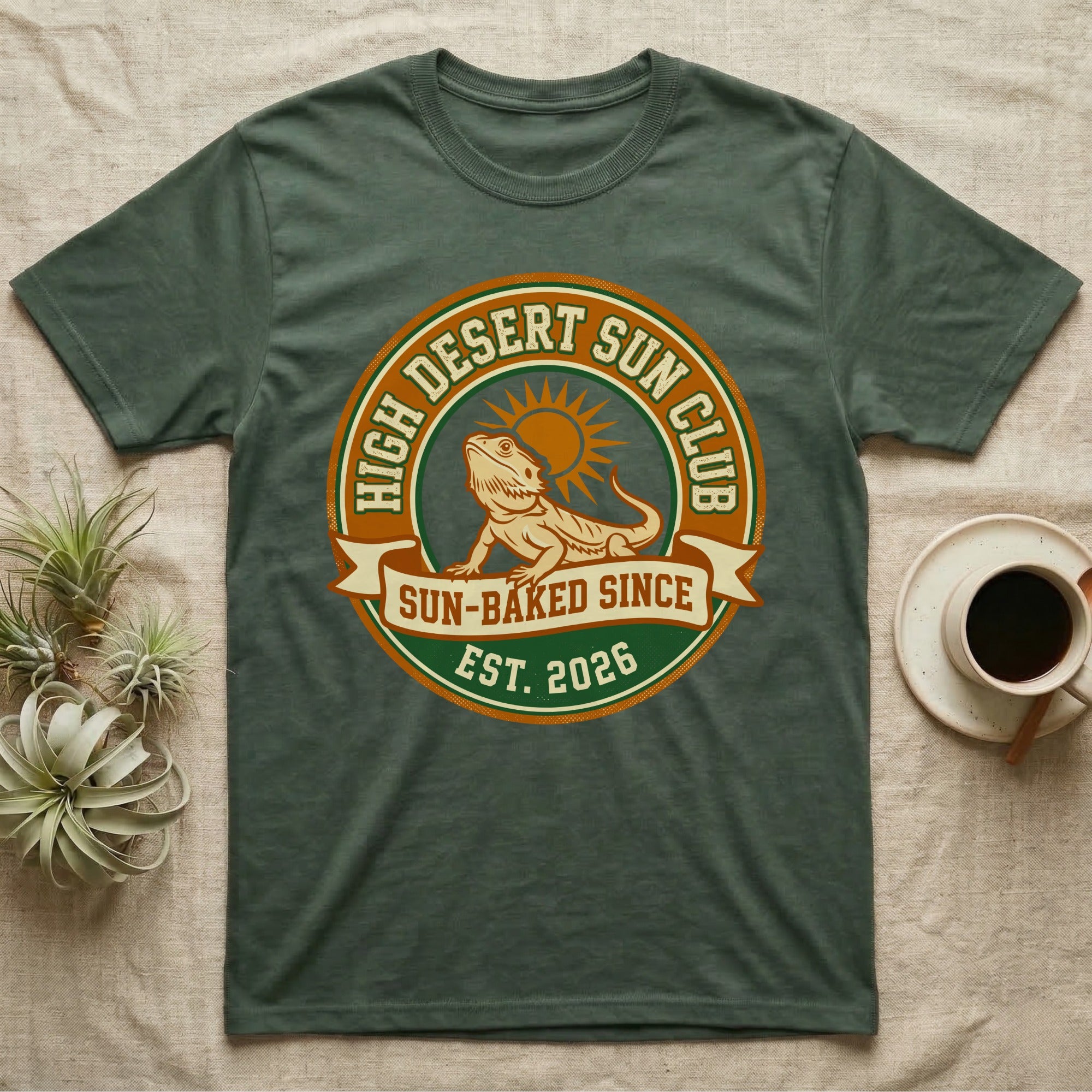 Green t-shirt with "High Desert Sun Club" logo featuring a lizard and sun.