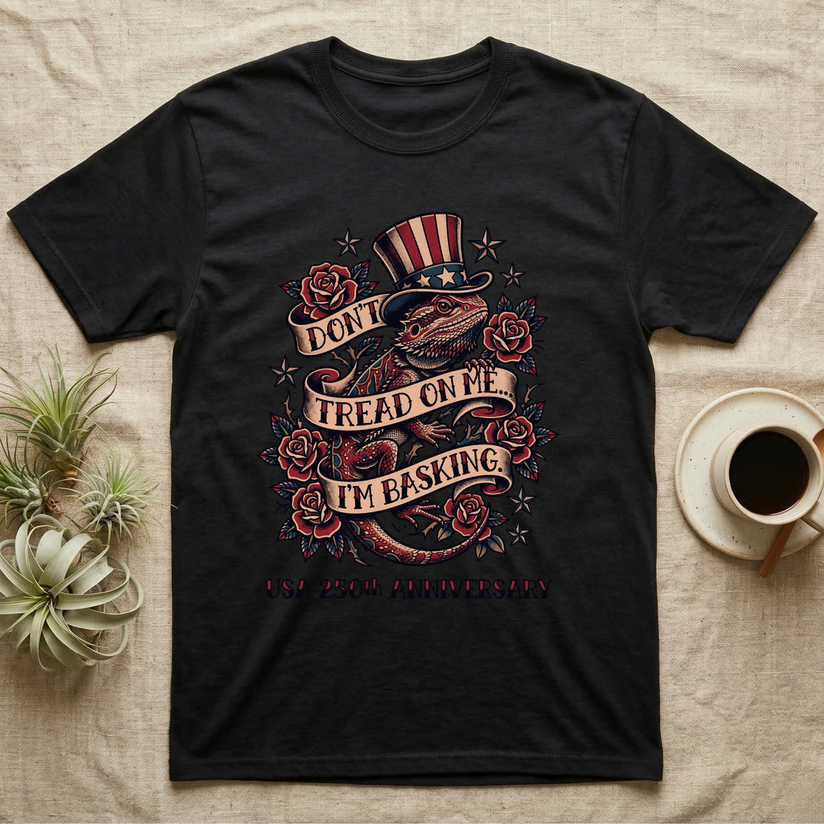 Bearded Dragon Tattoo T-Shirt in Black — Tattoo-flash bearded dragon in a star top hat among roses with banners reading Don't Tread On Me I'm Basking.