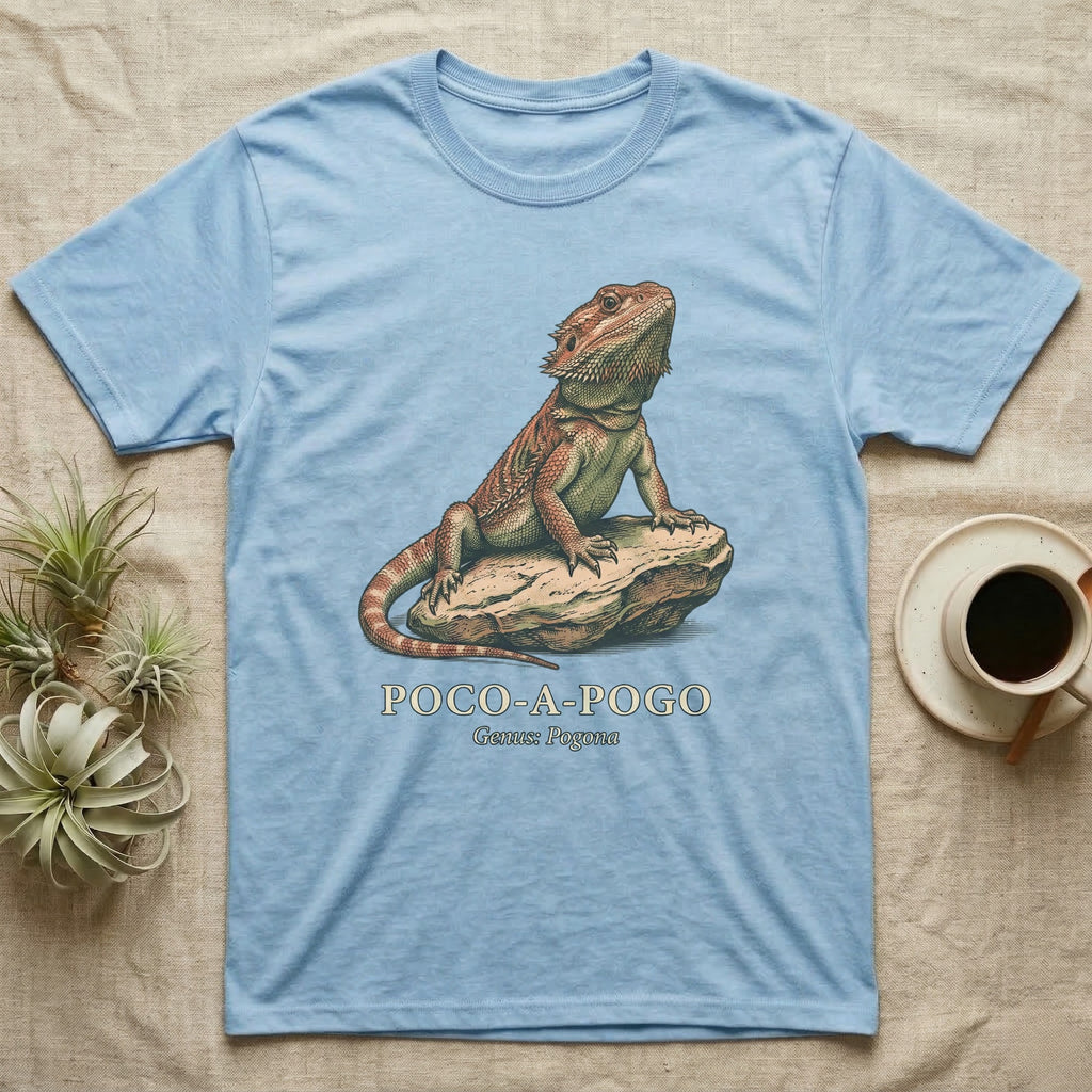 Light blue t-shirt with a bearded dragon on a rock, "POCO-POGO" text.