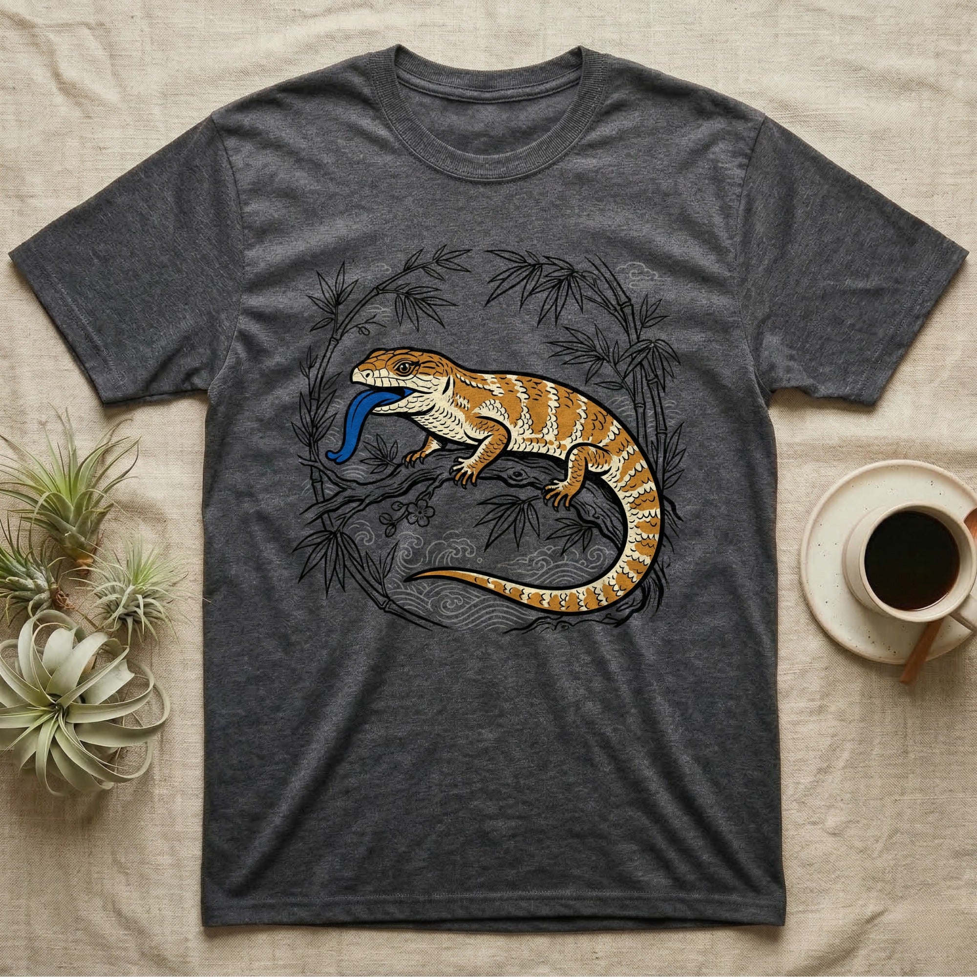 Dark grey t-shirt with a bearded dragon and bamboo branch graphic.