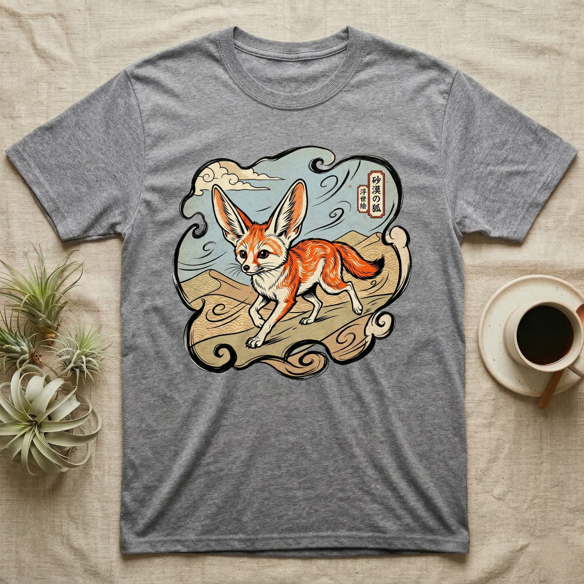 T-shirt with stylized fennec fox illustration and Japanese text.