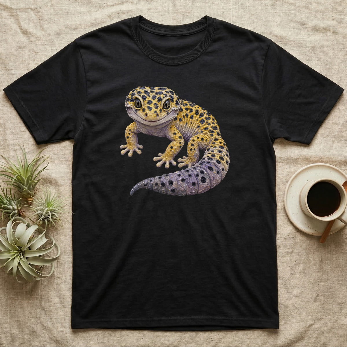 Black t-shirt with a realistic gecko illustration centered on the chest.
