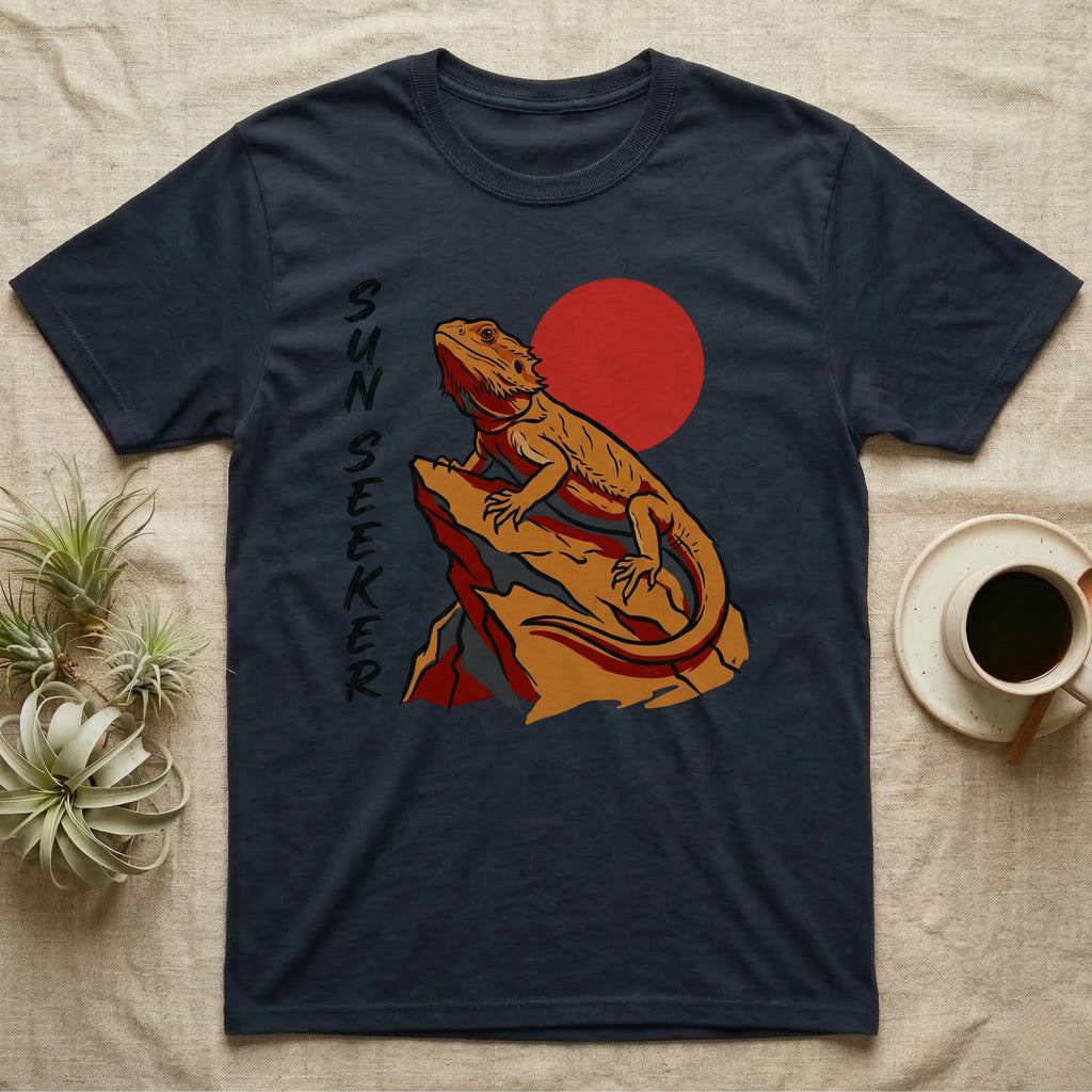Bearded dragon on rock with red sun behind, "SUN SEEKER" text.