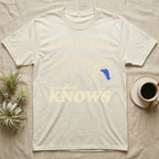 Blue-Tongue Skink Mood T-Shirt — Cream engraved blue-tongued skink on black flashing a cobalt blue tongue under the words WHEN I'M BLUE everyone KNOWS